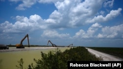 The U.S. Army Corps of Engineers work on the construction of the Everglades Agricultural Area Reservoir, Wednesday, May 15, 2024, in South Bay, Fla.