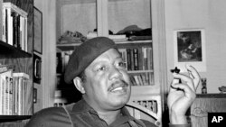 FILE - Author Ernest Gaines, who wrote "The Autobiography of Miss Jane Pittman," is seen in his San Francisco home, April 12, 1977. 