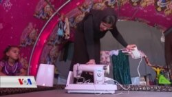 ژنێکی ئێزیدی بە مەکینەیەکی درومان بژێوی ژیانی دابیندەکات