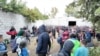 Autoridades mexicanas hallan a casi 500 migrantes retenidos en un predio en Puebla