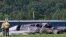 The burned remains of a plane that was carrying NASCAR television analyst and former driver Dale Earnhardt Jr. lies near a runway in Elizabethton, Tenn., Aug. 15, 2019.