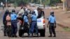 Guinean police detain supporters of UFDG presidential candidate Cellou Dalein Diallo suspected of throwing stones and looting in Conakry, November 15, 2010. 