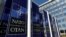 FILE PHOTO: Banners displaying the NATO logo are placed at the entrance of new NATO headquarters during the move to the new building