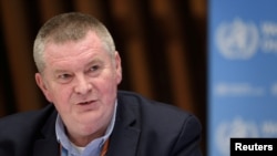 FILE - WHO Health Emergencies Program head Michael Ryan attends a news conference organized by the Geneva Association of United Nations Correspondents (ACANU) amid the COVID-19 outbreak, at the WHO headquarters in Geneva, Switzerland, July 3, 2020. 