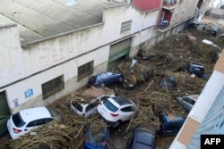 U poplavama izazvanim obilnim kišama u istočnoj španskoj regiji Valensija poginula je 51 osoba, saopštile su spasilačke službe. 30. oktobar, 2024. (Foto: AFP /Jose Jordan)