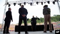 President Donald Trump joined by Secretary of Health and Human Services Tom Price, Secretary of Energy Rick Perry and Interior Secretary Ryan Zinke as he speaks at the 2017 National Scout Jamboree in Glen Jean, W.Va., July 24, 2017.