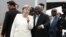German Chancellor Angela Merkel is welcomed by Ghana's Vice President Bawumia at the Jubilee Airport in Accra, Ghana, Aug. 30, 2018.