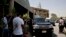 Mexico's Secretary of Foreign Relations Claudia Ruiz Massieu leaves in her vehicle after her visit to injured Mexican tourists at the Dar Al Fouad Hospital in Cairo, Egypt, Wednesday, Sept. 16, 2015.