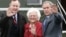 U.S. President George W. Bush (R) waves alongside his parents, former President George Bush and former first lady Barbara Bush upon their arrival Fort Hood, Texas, April 8, 2007. 