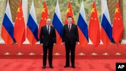 Ruski i kineski predsjednici - Vladimir Putin i Xi Jinping