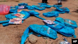 Children's backpacks lie at the site a day after an airstrike in Saada, Yemen on Aug. 10, 2018. 