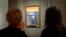 FILE - Two women view Edvard Munch's iconic "The Scream", a pastel-on-board (1895) during a press preview of an exhibition of Munch's work at New York City's Museum of Modern Art (MoMA) October 24, 2012. ( REUTERS/Mike Segar)
