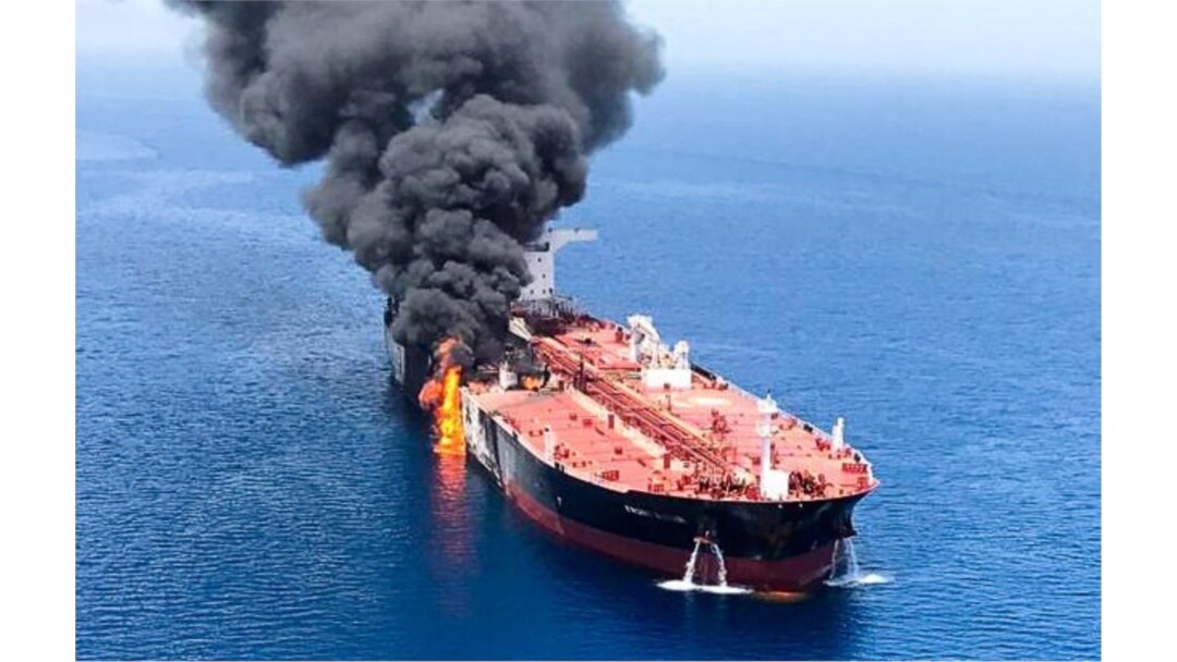 FILE - An oil tanker is seen after it was attacked at the Gulf of Oman, June 13, 2019.