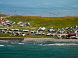 Aerial view of Shishmaref, a village on Sarichef Island in the Chukchi Sea, just north of the Bering Strait in western Alaska.