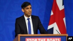 Britain's Prime Minister Rishi Sunak updates on the plan to "stop the boats" and illegal migration during a press conference in the Downing Street Briefing Room in London, Dec. 7, 2023. 