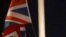 British Navy sailors lower the British flag at the Tamar at the closing of the Farewell Ceremony in Hong Kong Monday, June 30, 1997. The British troops depart Hong Kong, following the handover ceremony at midnight. (AP Photo/David Longstreath)