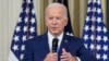 FILE - President Joe Biden answers questions from reporters as he speaks in the State Dining Room of the White House in Washington, Nov. 9, 2022.