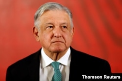 FILE - Mexico's President Andres Manuel Lopez Obrador attends a news conference at the National Palace in Mexico City, June 10, 2019.