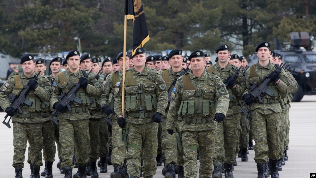 FILE - Members of the Kosovo Security Force (KSF) take part in a ceremony in the Kosovo capital Pristina.