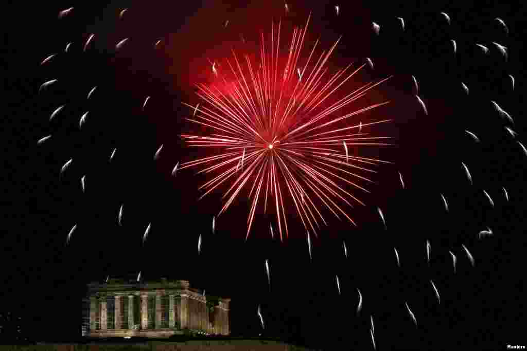 Fireworks explode over the Parthenon temple to celebrate the Greek Orthodox Easter, amid the COVID-19 outbreak, in Athens, Greece, May 1, 2021.