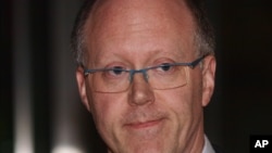 BBC Director-General, George Entwistle, announces his resignation from the BBC outside New Broadcasting House in central London on Nov. 10, 2012. 