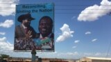 FILE - A billboard in Juba shows South Sudan's President Salva Kiir (L), and rebel leader Riek Machar, April 15, 2016. (J. Patinkin/VOA)