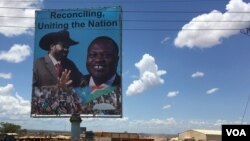 FILE - A billboard in Juba shows South Sudan's President Salva Kiir (L), and rebel leader Riek Machar, April 15, 2016. (J. Patinkin/VOA)