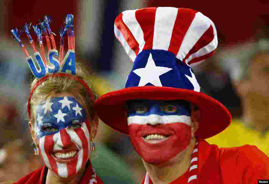 Diz-se que a torcida americana é a maior de todas. Sendo ou não, eles estão a rigor! Momentos antes do jogo contra o Gana na Arena Dunas em Natal, Junho 16, 2014. REUTERS/Stefano Rellandini