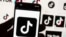FILE - The TikTok logo is seen on a cell phone on Oct. 14, 2022, in Boston. 