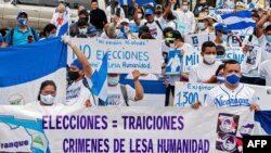 Los nicaragüenses residentes en Costa Rica se manifiestan en San José para conmemorar el tercer aniversario del inicio de las protestas contra el gobierno del presidente nicaragüense Daniel Ortega, el 18 de abril de 2021.