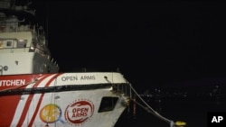 FILE — The ship belonging to the Open Arms aid group is seen docked, as it prepares to ferry some 200 tons of rice and flour directly to Gaza, at the Larnaca harbor, Cyprus, on Friday, March 8, 2024.