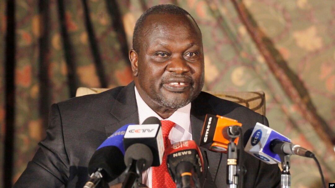 FILE - South Sudan rebel leader Riek Machar addresses journalists during a news conference in Nairobi, Kenya.