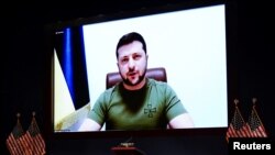 Владимир Зеленский выступает с видеообращением к Конгрессу. 16 марта 2022 г. 