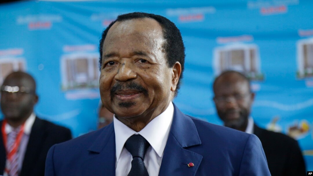 FILE - Paul Biya, of the Cameroon People's Democratic Movement party, waits to cast his vote during the presidential elections in Yaounde, Oct. 7, 2018.