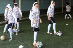 Iranian women exercise at a football school in Tehran, Sept. 14, 2019.