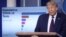 U.S. President Donald Trump speaks in front of a chart on coronavirus testing during a coronavirus response news briefing