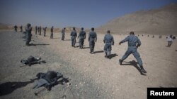Afghan police recruits train in Kabul. 
