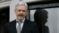 FILE - WikiLeaks founder Julian Assange speaks from the balcony of the Ecuadorean Embassy in London, Feb. 5, 2016.