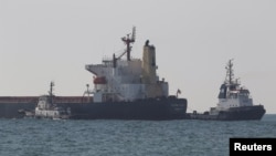 FILE: A Liberian-flagged bulk carrier Ocean Lion leaves the sea port in Chornomorsk after restarting grain export, amid Russia's attack on Ukraine. Taken 8.9.2022