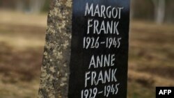 A memorial stone for Margot Frank and Anne Frank is pictured on the grounds of the former Prisoner of War (POW) and concentration camp Bergen-Belsen, March 18, 2020, near Lohheide, north of Hanover, central Germany.