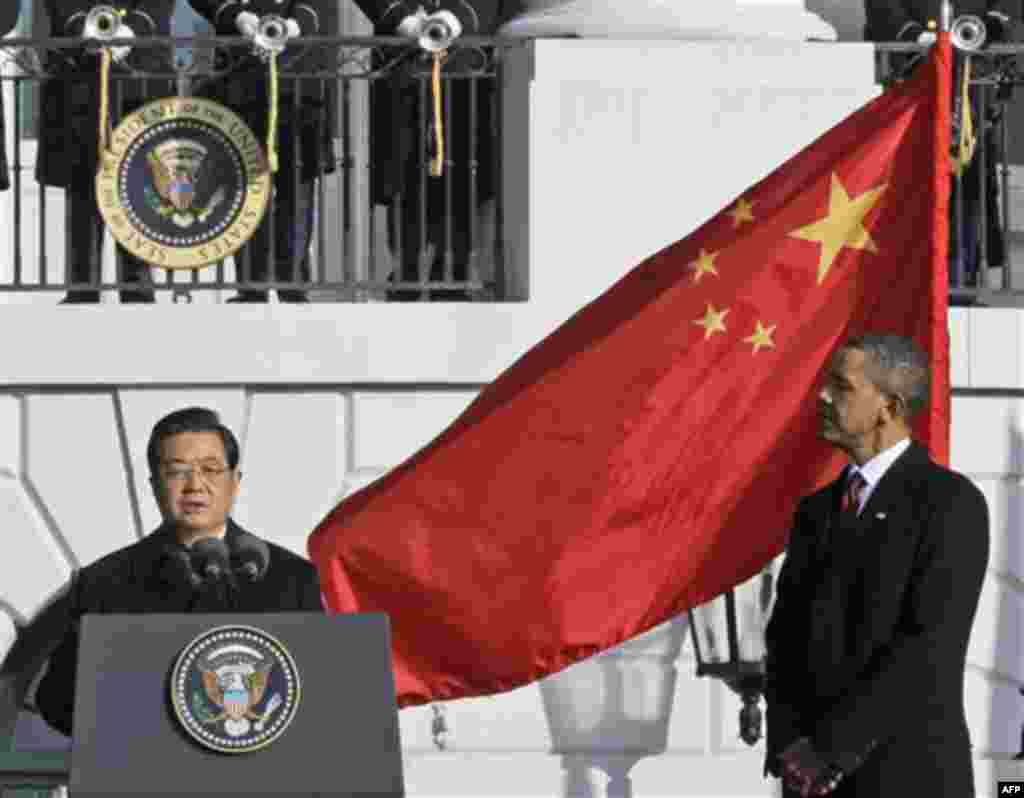 President Barack Obama listens as China's President Hu Jintao speaks during a state arrival on the South Lawn of the White House in Washington, Wednesday, Jan. 19, 2011. (AP Photo/Charles Dharapak)