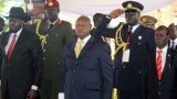 A government minister said on Sunday, Aug. 16, 2015, that President Salva Kiir (left) was convinced by regional leaders, and especially Ugandan President Yoweri Museveni (C.), to attend peace talks in Addis Ababa. The warring sides have until Monday to sign a peace deal.