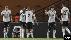 FILE - Libya's players celebrate after a goal during the CAF Africa Cup of Nations qualification match between Benin and Libya at the Felix Houphouet-Boigny Stadium in Abidjan, Ivory Coast, Sept. 10, 2024. 