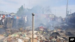 Le marché central de Maiduguri, Nigeria, après un attentat sucide le1er juillet 2014. (AP Photo/Jossy Ola)