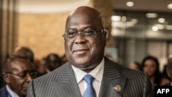 (FILES) President of the Democratic Republic of the Congo Felix Tshisekedi leaves the venue after a mini-summit on Peace and Security in eastern Democratic Republic of Congo (DRC) on the sidelines of the 36th Ordinary Session of the Assembly of the Africa