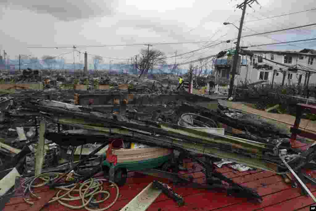 Homes devastated by fire and effects of Hurricane Sandy at the Breezy Point section of the Queens borough of New York, October 30, 2012.