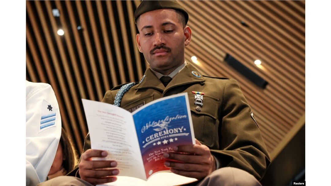 Private First Class Diaz Salazar waits to take his Oath of Allegiance during his U.S. Citizenship and Immigration Services naturalization ceremony at the New York Public Library in New York on July 2, 2024.