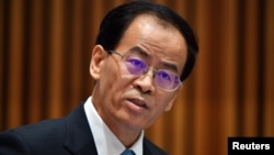 China's Ambassador to Australia Cheng Jingye looks on after speaking at an Australia China Business Council (ACBC) Canberra Networking Day event at Parliament House in Canberra, Australia, June 19, 2018. 