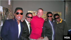 The Jacksons meet up with Border Crossings host Larry London for an interview on his VOA radio program.