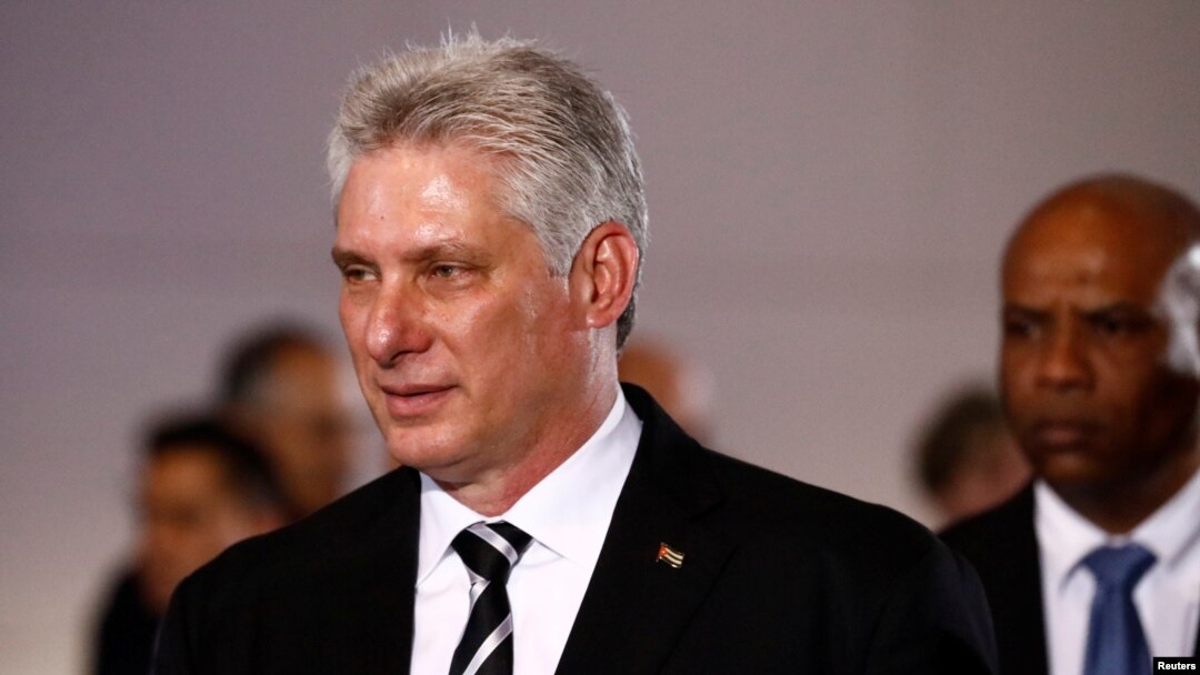 FILE - Cuba's President Miguel Diaz-Canel attends a ceremony at the National Pantheon in Caracas, Venezuela, May 30, 2018. On July 21, 2018, Cuban lawmakers approved Diaz-Canel's Cabinet, keeping most of the ministers from Raul's Castro government in place. 